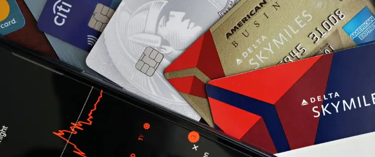 Credit card debt consolidation A fan of credit cards on a dark surface