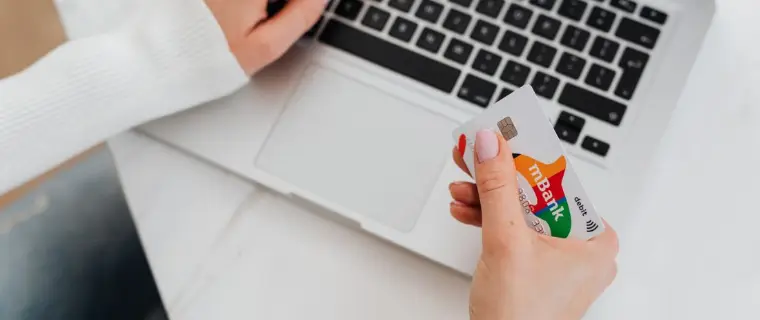 Comparing loans online in the UK Managing money online using a laptop