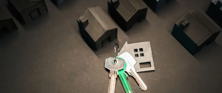 Secured loans in the UK House keys resting on a table